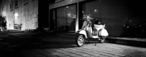 Black and white image of Vespa scooter