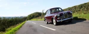 Classic Wolseley car on open road